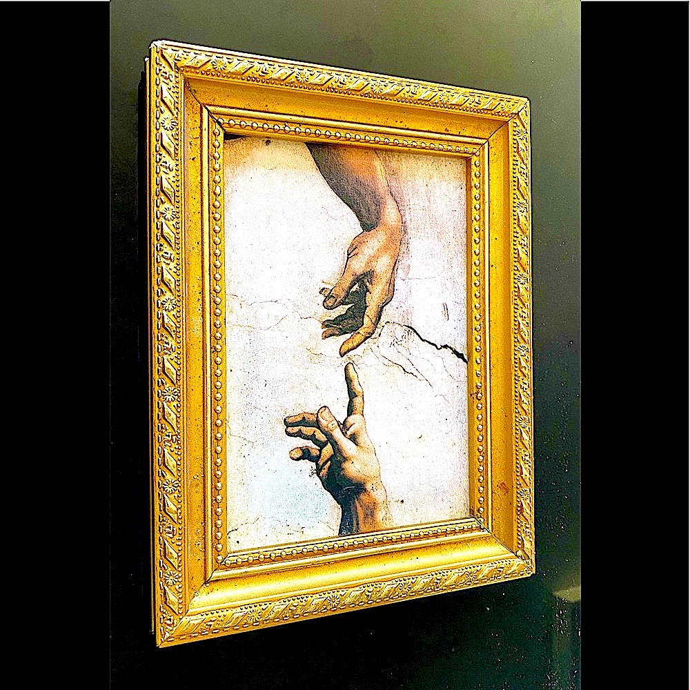 Michelangelo’s God and Adam